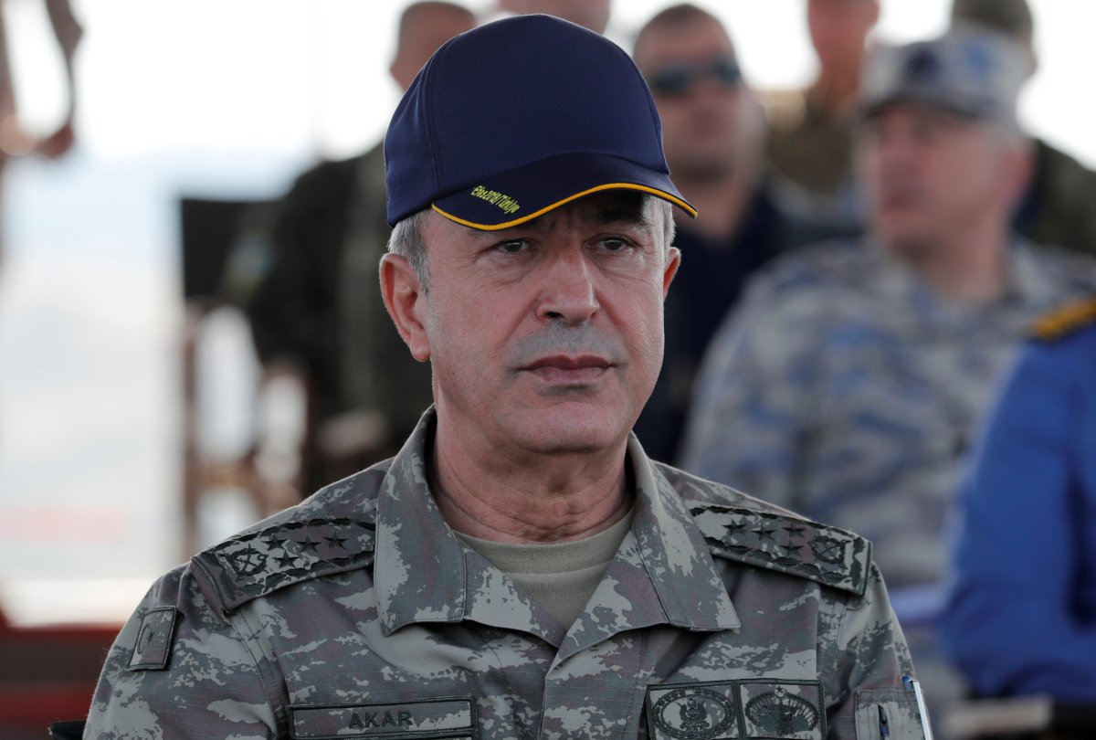 Near Syrian border, Turkish defense minister vows operation when time is right