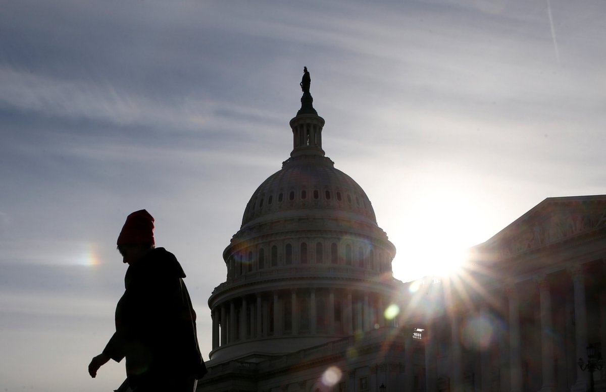 U.S. government reopens with clock running on funding talks