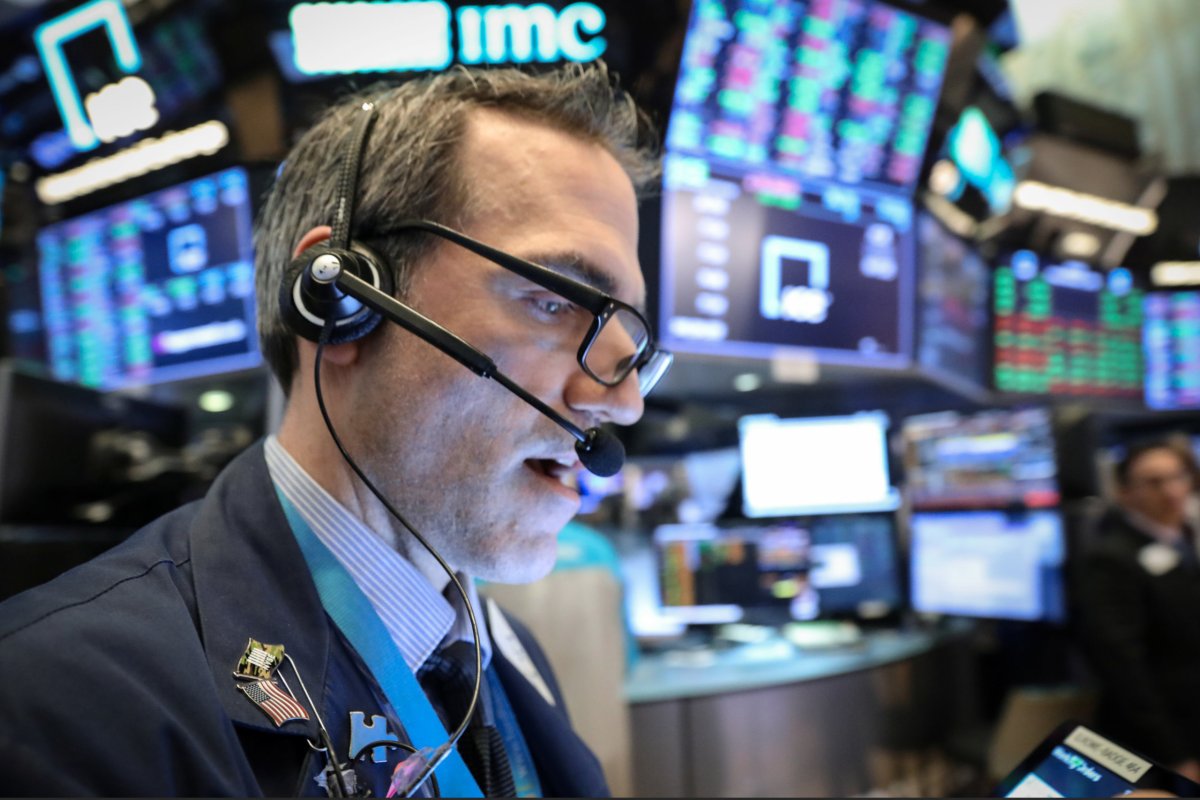 Wall Street opens lower on trade woes