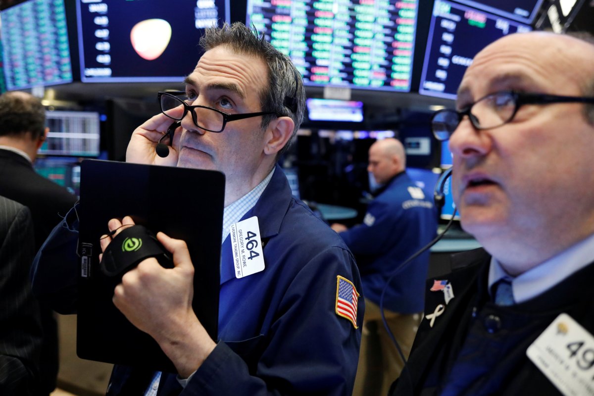 Wall Street climbs as financials snap five days of losses