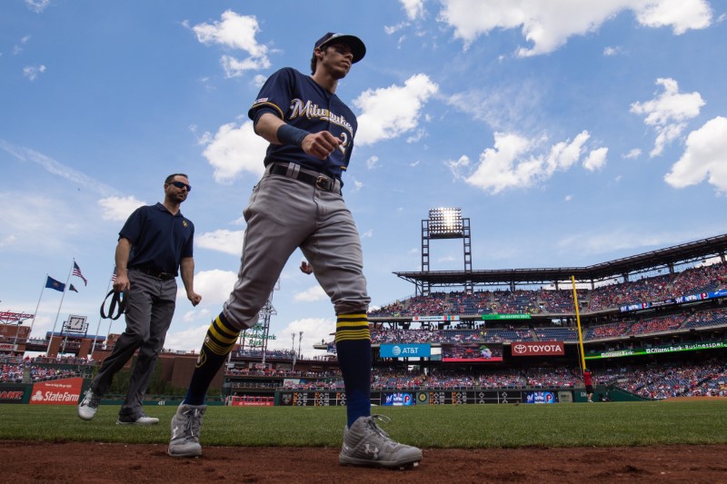 MLB notebook: Yelich out due to back spasms