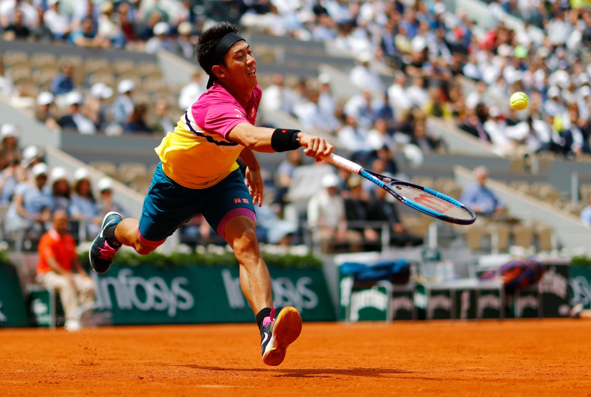 Nishikori downs Tsonga to reach French Open third round