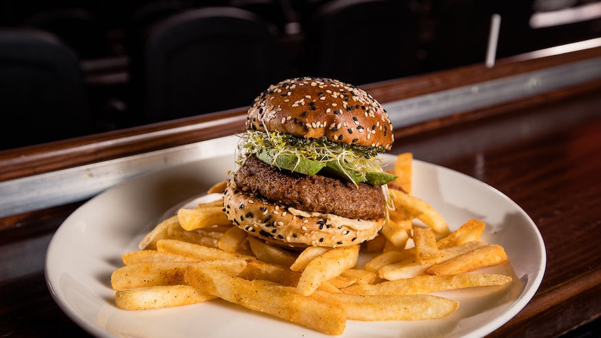 The Beyond Burger comes to Alamo Drafthouse Brooklyn (with fries) as part of the chain's new vegan menu.