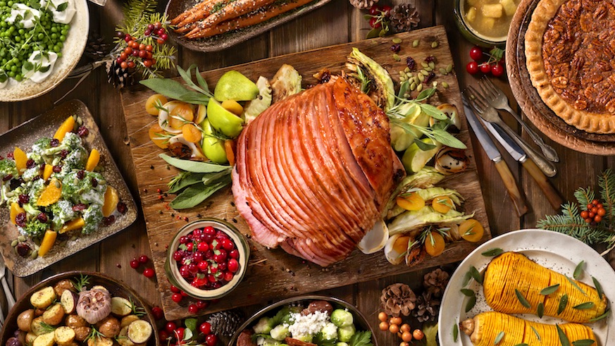A ham is a traditional centerpiece of American Christmas Eve dinners, but what about the rest of the world? Credit: iStock