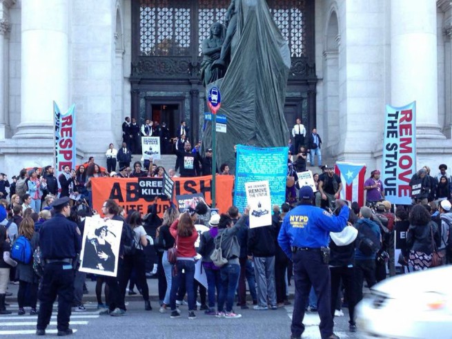 Anti-Columbus Day activists host alternative tour of the American Museum of Natural History.