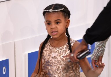 Blue Ivy enjoys cotton candy in $1,800 Gucci dress because she can