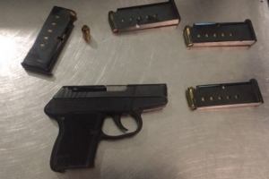 The loaded .380 caliber firearm and magazines discovered by TSA agents at Logan Airport this week. Photo: TSA