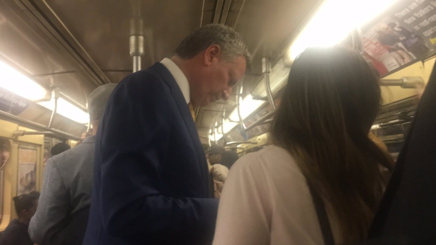 New York Mayor Bill de Blasio traded in his SUV to take a subway ride.