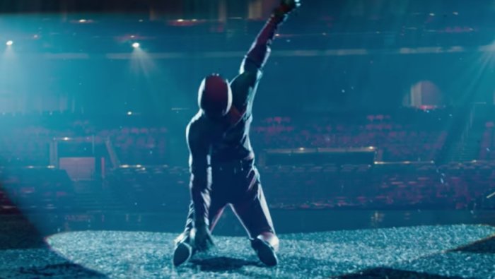 Celine Dion does the belting, Deadpool does the dancing in the music video for Ashes.