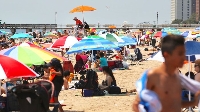 You'll still have to leave your beach towel, but Domino's will deliver almost to the beach. Credit: Getty Images
