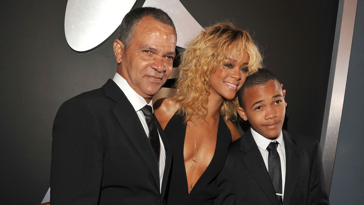 Why is Rihanna suing her father?
