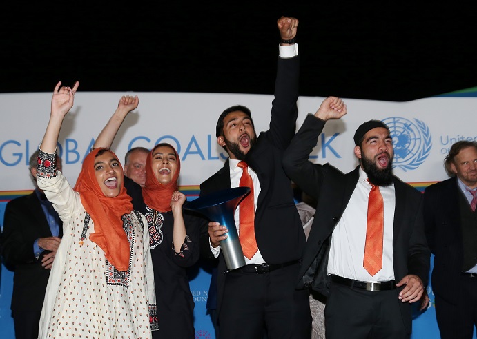 The Roshi Ride team from Rutgers University cheers after winning the Hult Prize Finals and Awards Dinner 2017 on Saturday, Sept. 16, 2017, at the United Nations headquarters. (Mark Von Holden/Hult Prize Foundation via AP Images)