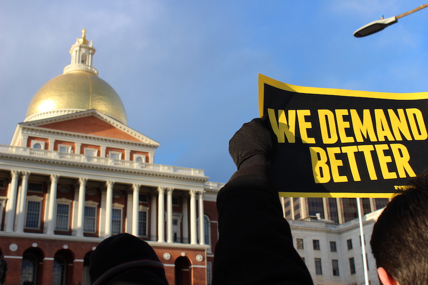 Members of Represent Us were outside the Massachusetts State House recently to demand campaign finance reform.