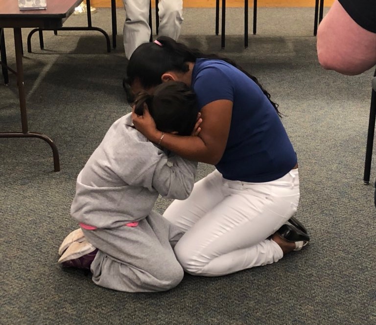 Angelica Rebeca Gonzalez-Garcia and her 8-year-old daughter were reunited at Logan Airport on Thursday. Photo: ACLU Massachusetts/Twitter