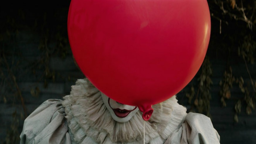 Pennywise holding a balloon
