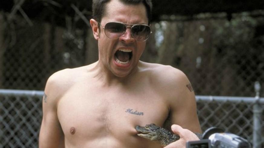 Johnny Knoxville squealing while being bitten by a baby crocodile