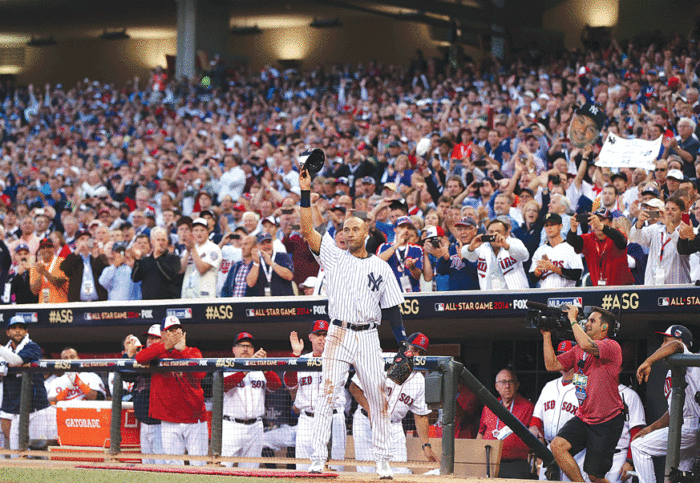 New York Yankees shortstop Derek Jeter is saluted by the fans at Target Field in a game against the Minnesota Twins.