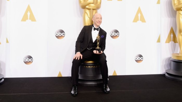 J.K. Simmons holding his Oscar