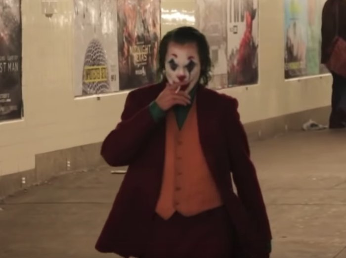 Joaquin Phoenix spotted as Joker inside Brooklyn subway station.