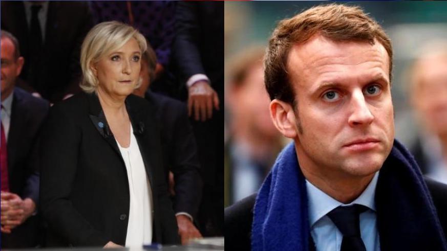 Marine Le Pen, left and Emmanuel Macron. (Reuters)