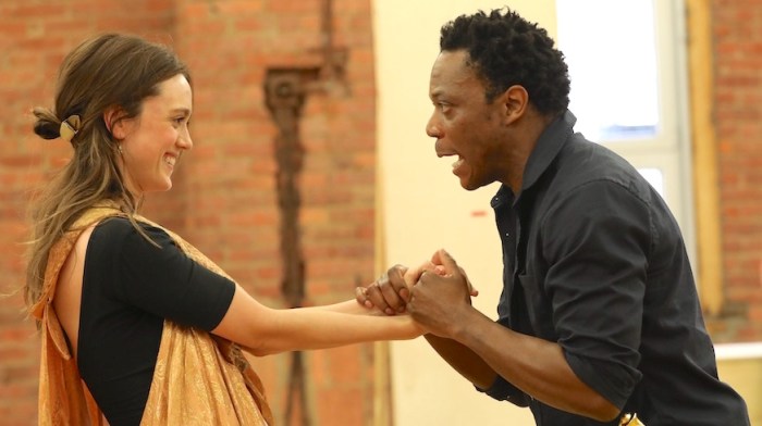 Heather Lind (Desdemona) and Chukwudi Iwuji (Othello) in rehearsal for Shakespeare in the Park's Othello.