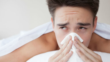 post-orgasmic illness syndrome man sneezing