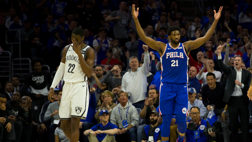 Joel Embiid (right) and the 76ers demolished the Nets in Game 2 of their first-round playoff series. (Photo: Getty Images)