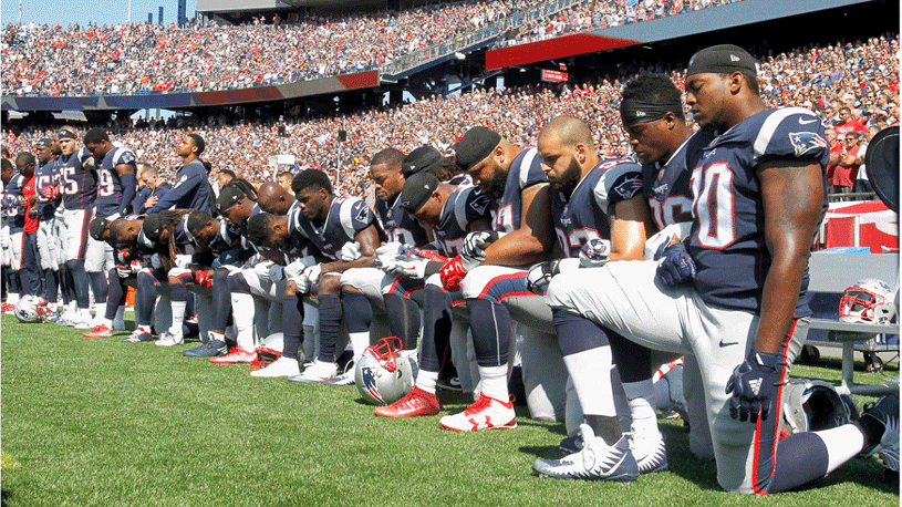 NFL players respond to Donald Trump with anthem protests