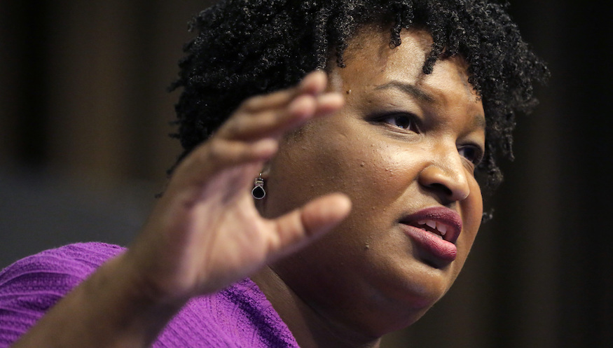 Stacey Abrams weighs presidential decision, defends Biden