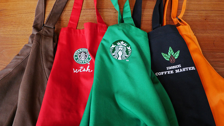What do the Starbucks apron colors mean?