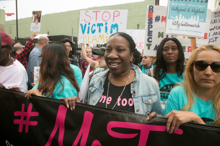 Tarana Burke marches at a #MeToo survivors march in Beverly Hills, California, last month. On New Year’s Eve, she will signal the ball drop live from Times Square. (Getty)