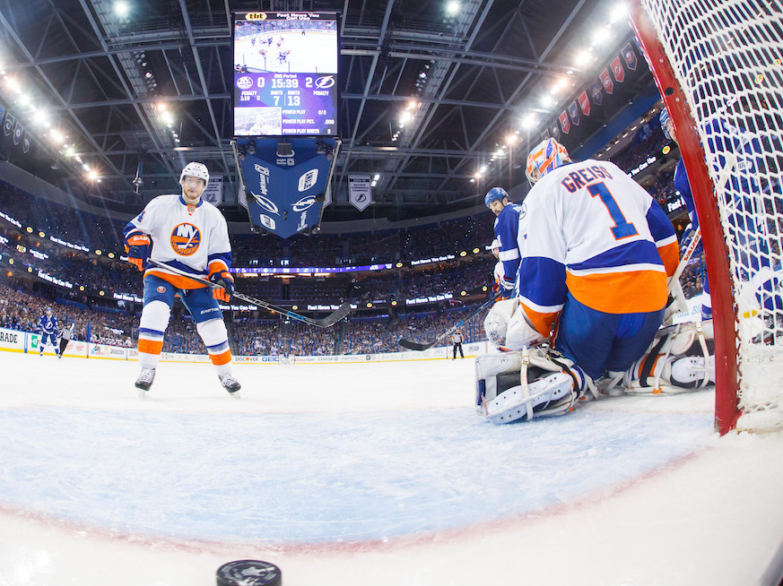 New York Islanders defenseman Thomas Hickey (left) can only watch as Thomas Greiss is beaten against the Tampa Bay Lightning.