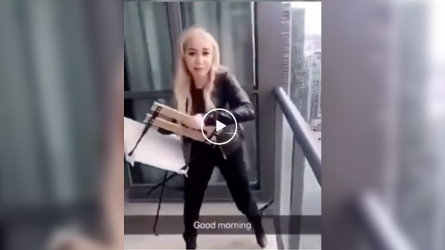 woman tosses chair off of toronto balcony