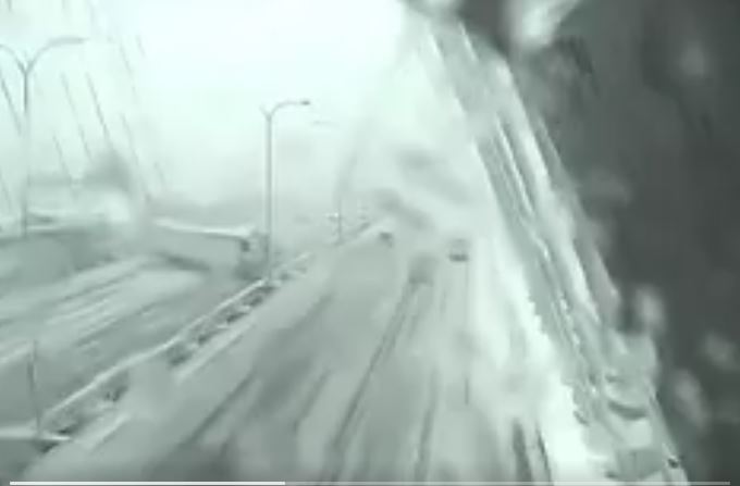 VIDEO: Tractor trailer spins out on Zakim Bridge during snowstorm