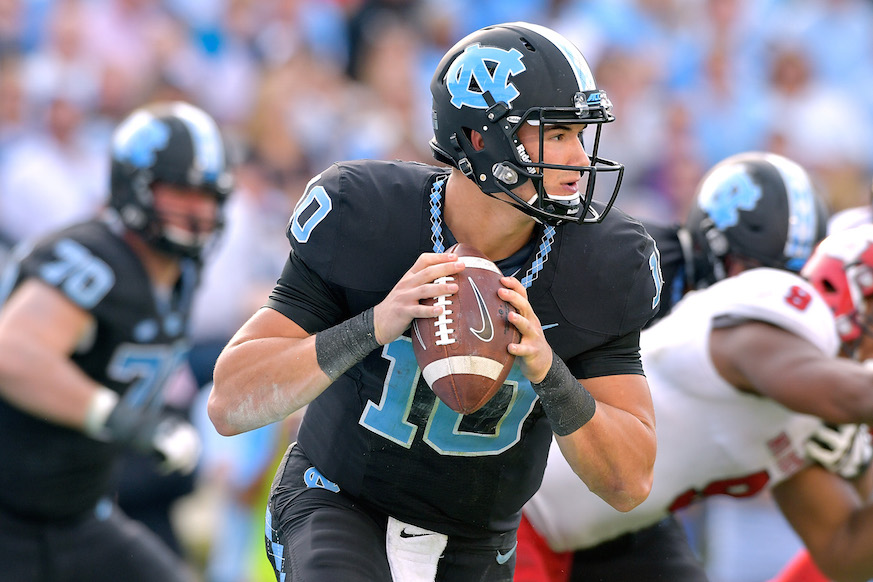 North Carolina quarterback Mitch Trubisky rolls out, looking for a pass.