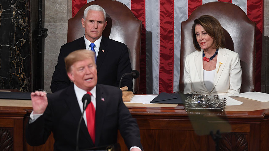 Vice President Mike Pence and House Speaker Nancy Pelosi look on as President Donald Trump delivers his State of the Union address on Feb. 5, 2019. (Photo: Getty Images)