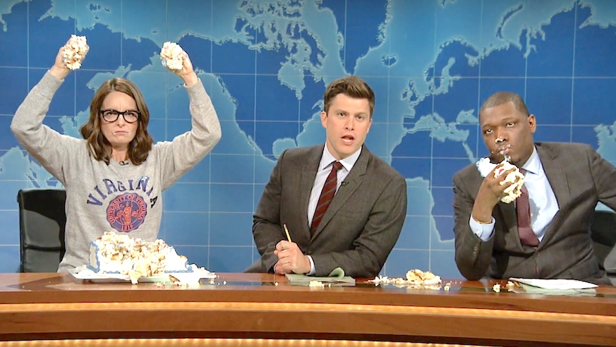 Tina Fey, Colin Jost and Michael Che eat cake to fight hate on Weekend Update: Summer Edition. Credit: NBC