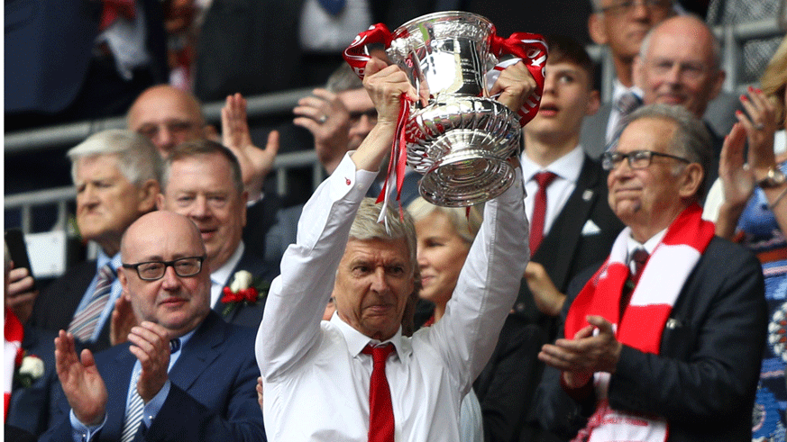 Arsenal manager Arsene Wenger lifts the FA Cup Trophy after his side defeated Chelsea. (Photo: Getty Images)