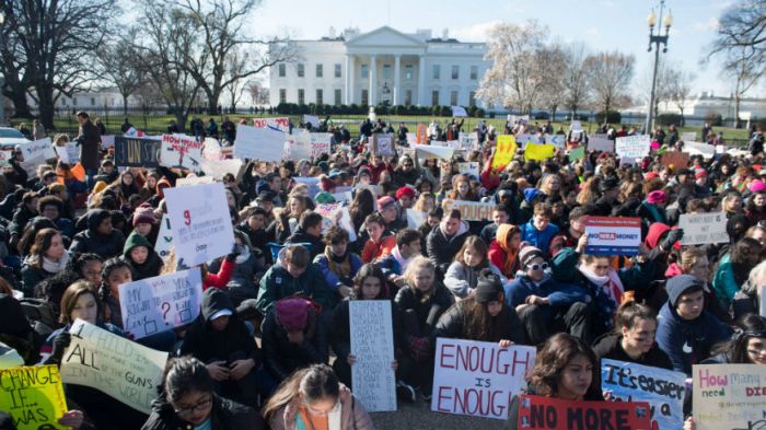 Students turn their backs on the white house on national school walkout day