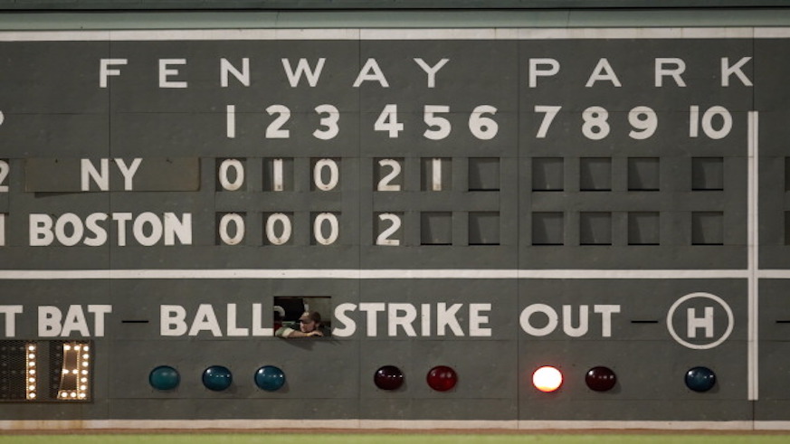The famous Green Monster at Boston's Fenway Park displaying the scoreline of a heated Yankees, Red Sox game. (Getty Images)