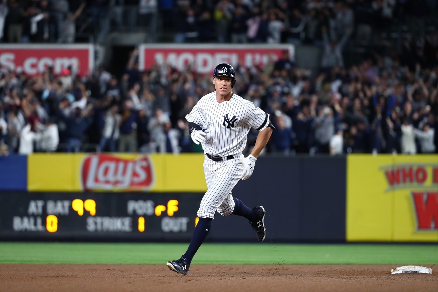 Power surge lifts Yankees past Twins in AL Wild Card Game