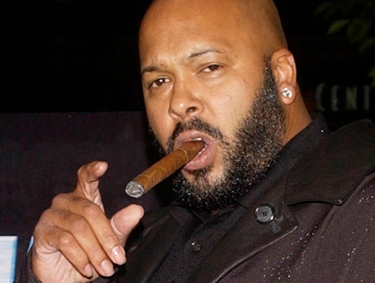 Suge Knight charged with murder after hit-and-run at burger joint