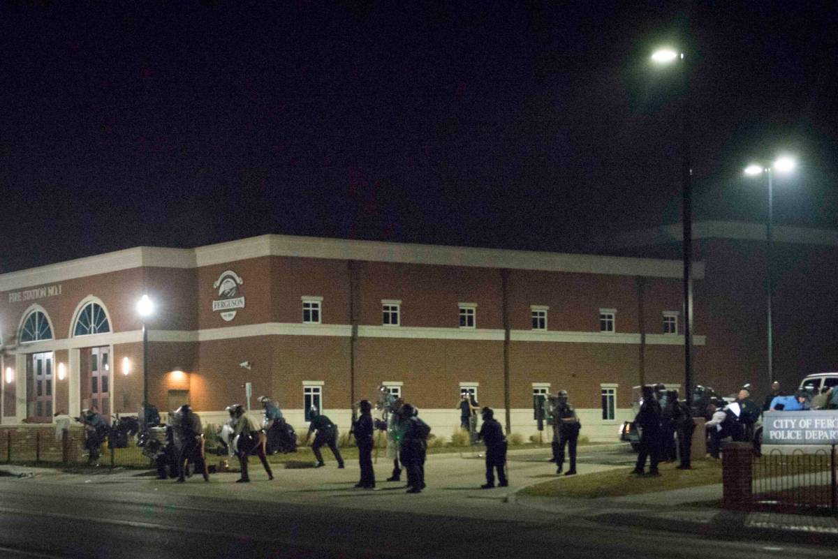 Two cops shot at protest outside Ferguson police HQ as chief quits