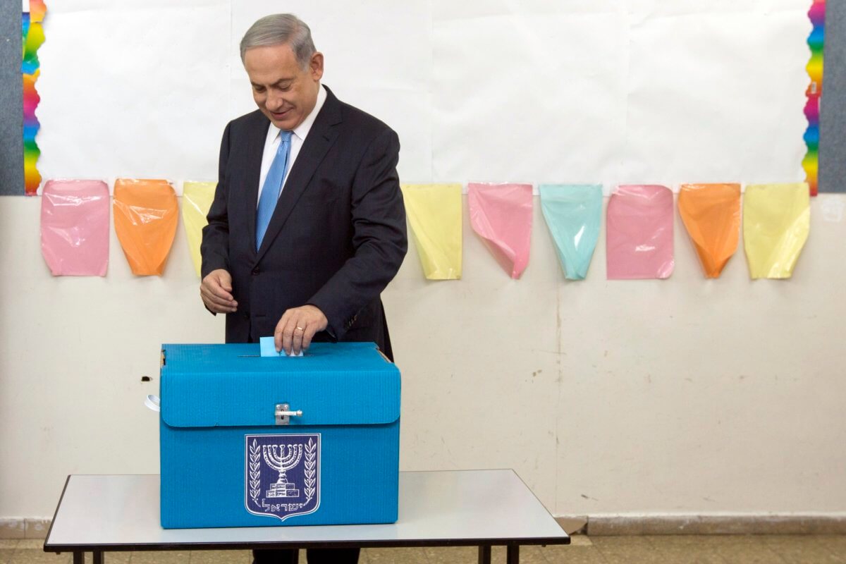 Israel’s longstanding leader faces defeat as jaded voters go to polls