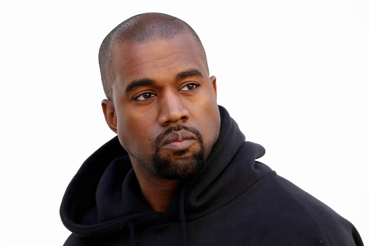Kanye West settles with snapper over camera-snatch airport assault