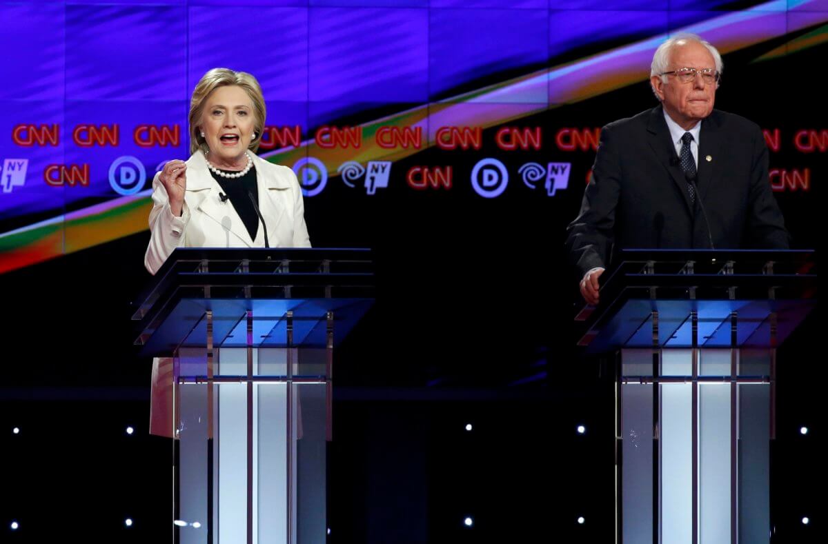 Clinton, Sanders battle over qualifications in rollicking NYC debate