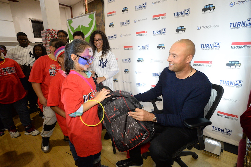 PHOTOS: Former Yankee captain Derek Jeter surprises children with gifts and