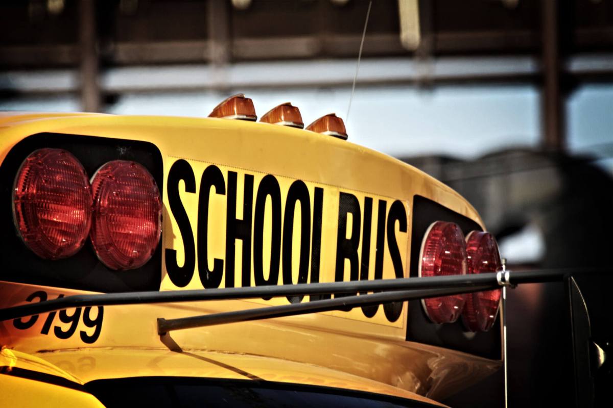 12 injured in school bus, car crash