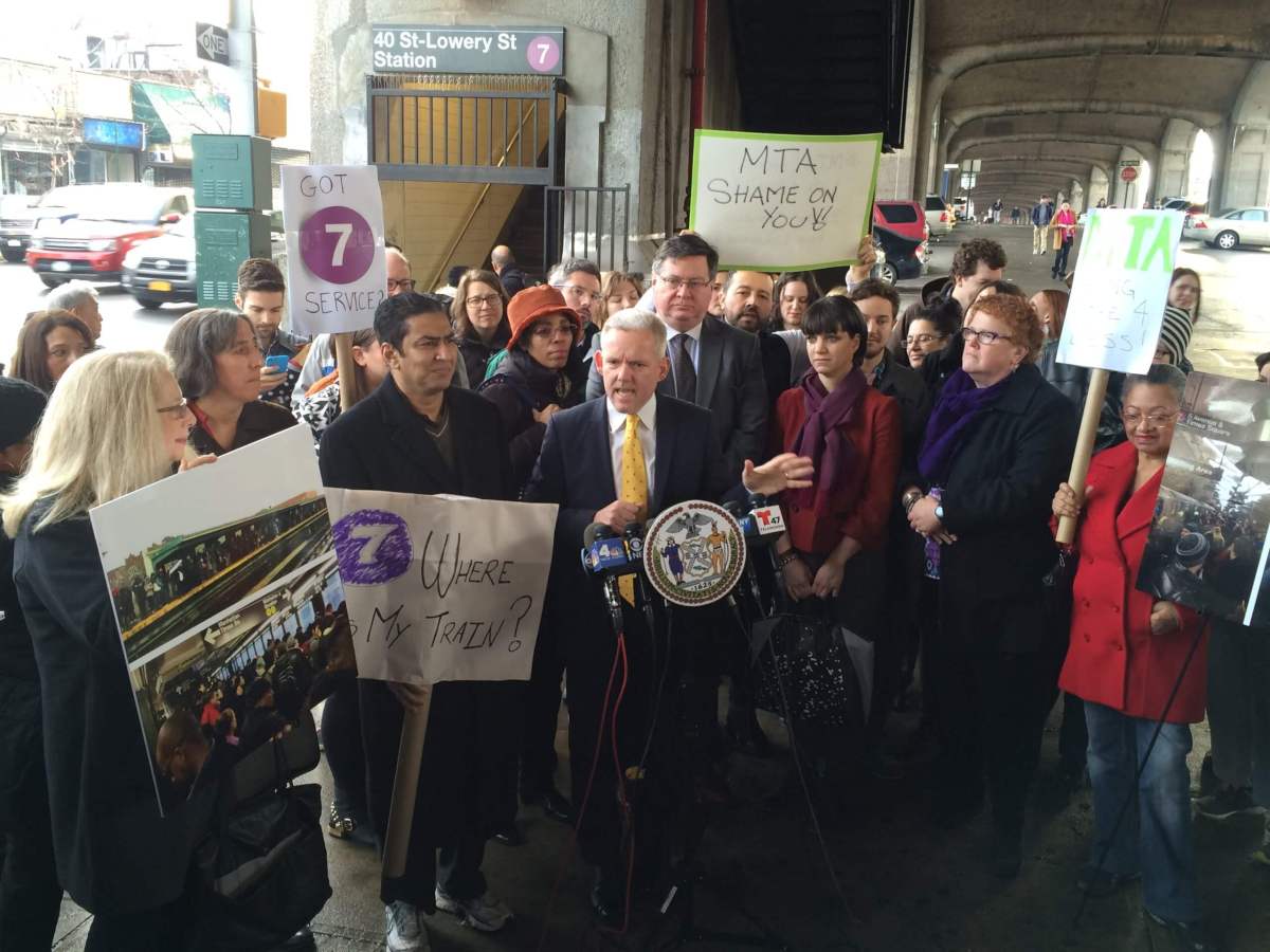 Fed-up 7 riders rally in Queens for better service, more transparency