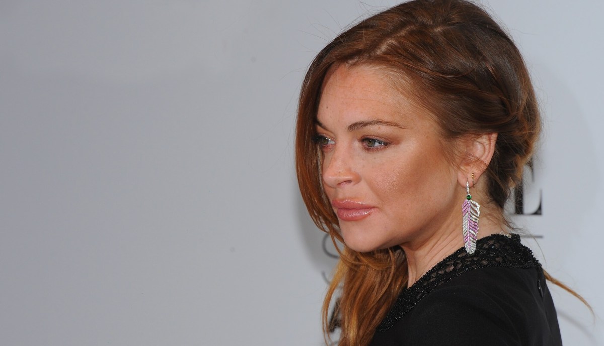 Lindsay Lohan is about to call the cops on her mom